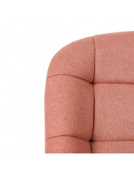 Butaca con base fija y asiento giratorio Sevilla tapizado en color rosa salmón.